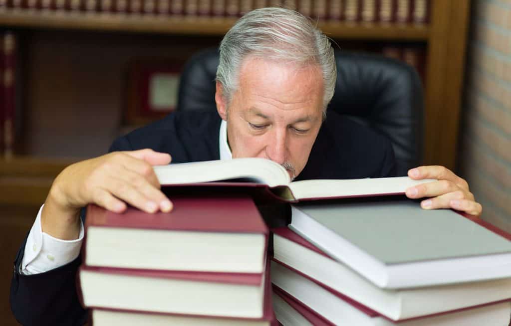 Lawyer reading boring books